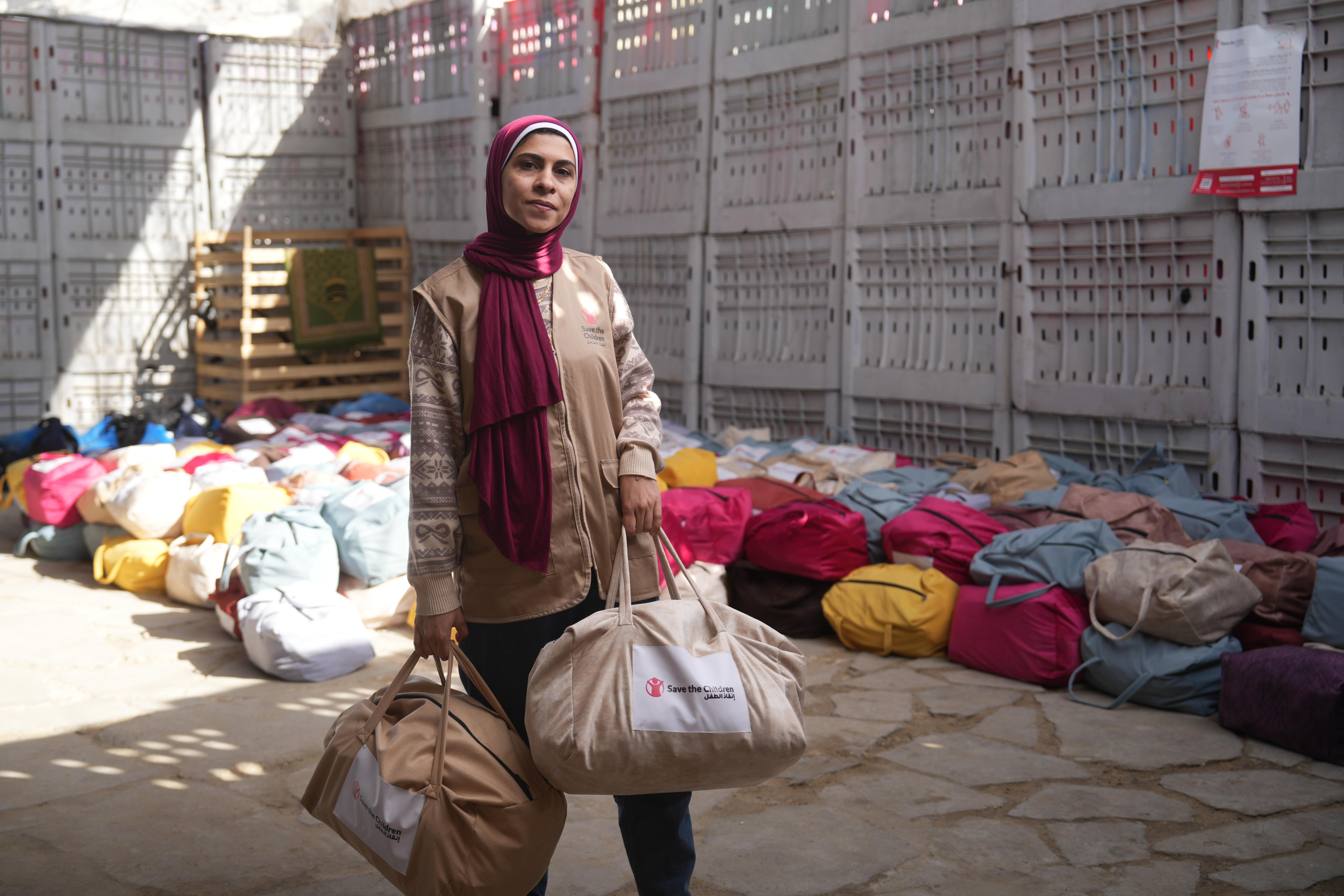 Winter weather is impacting families living in tents in Gaza. Save the Children is distributing winter kits containing warm clothes, as well as hygiene kits with essential hygiene items to families.