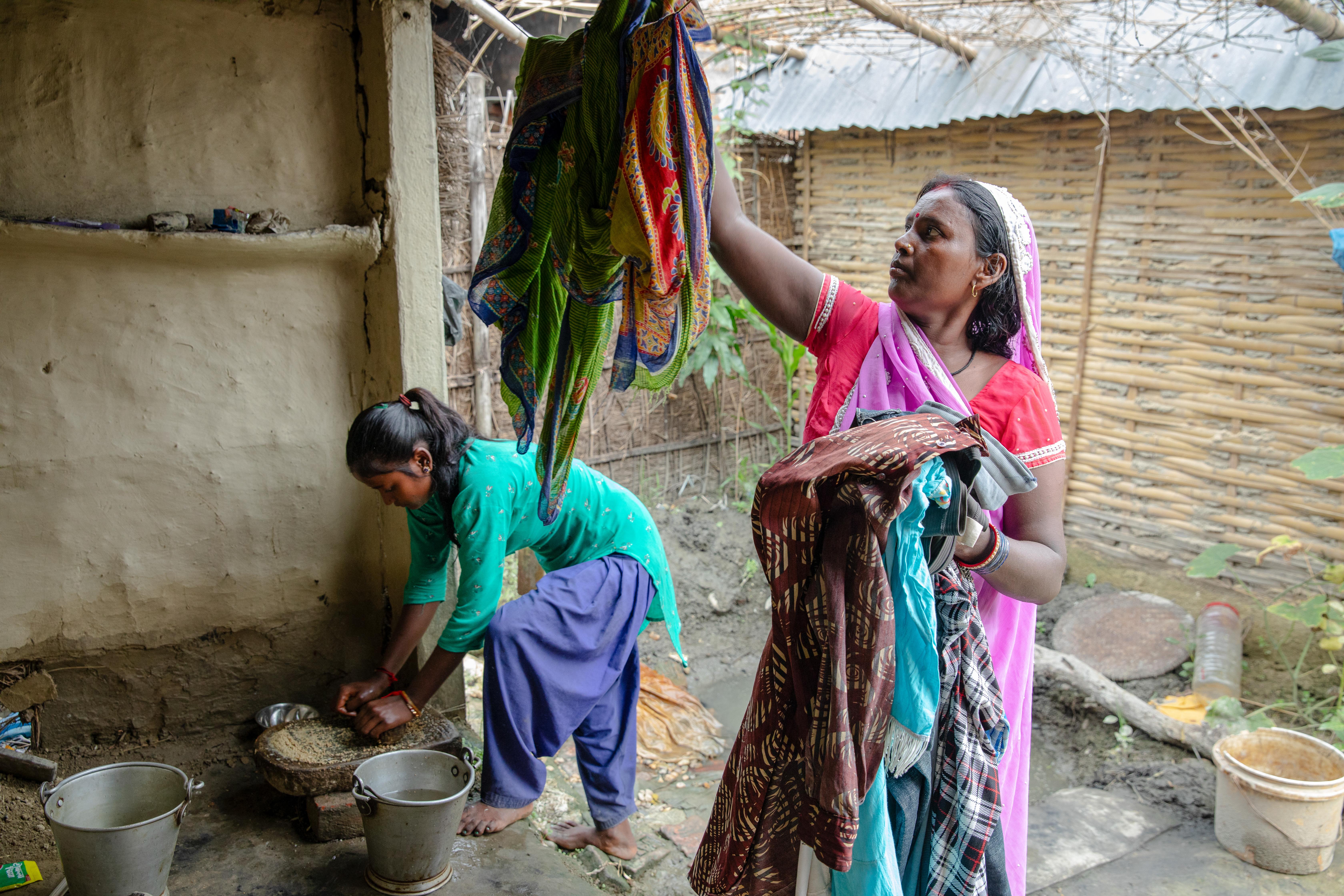 CH1875322_Mamata, 13, at home with her mother, Devkala, 55, Saptari, Nepal