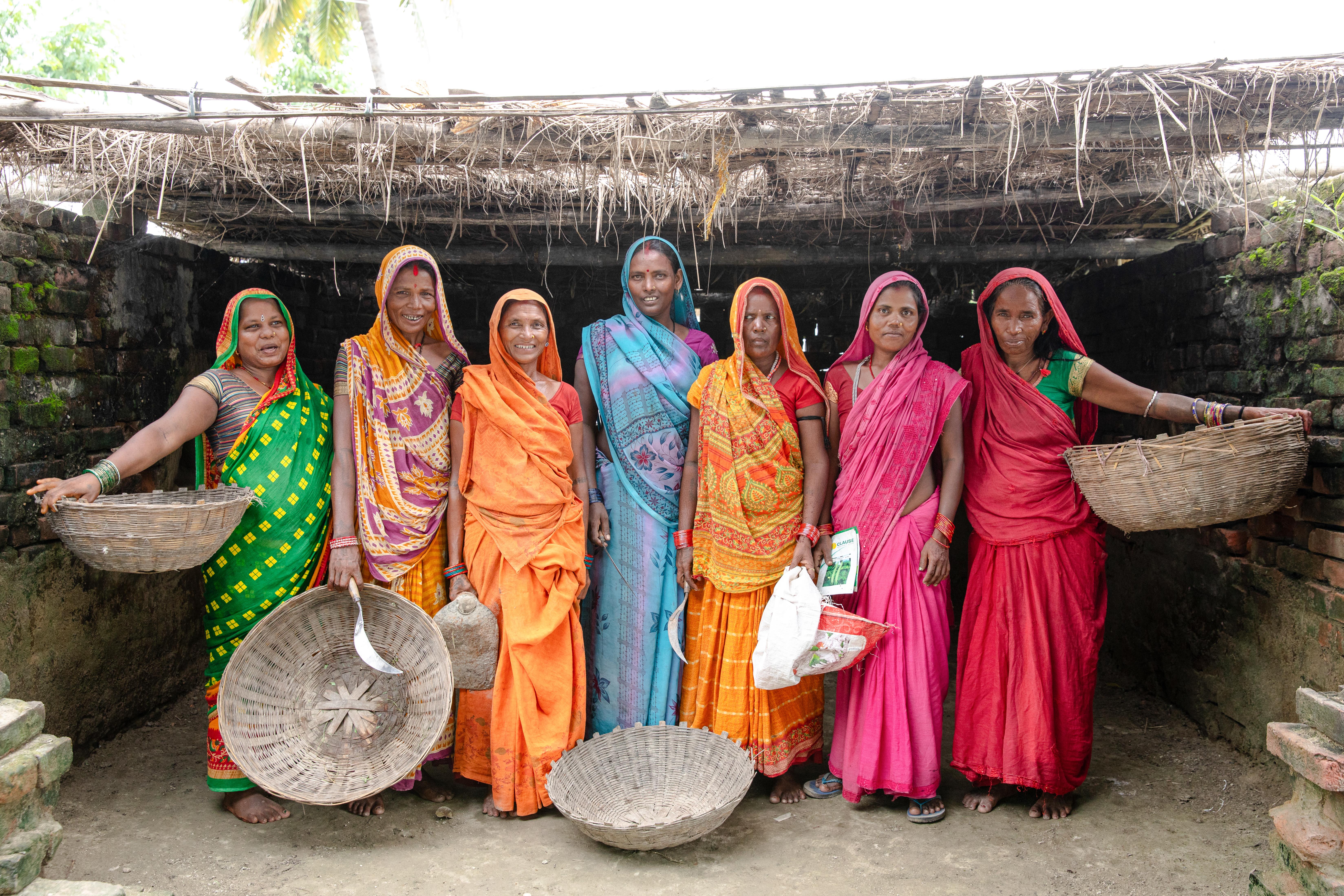 CH1875389_Devkala, 55, stands for a photo with other members of her Female Farmers� Group, establish