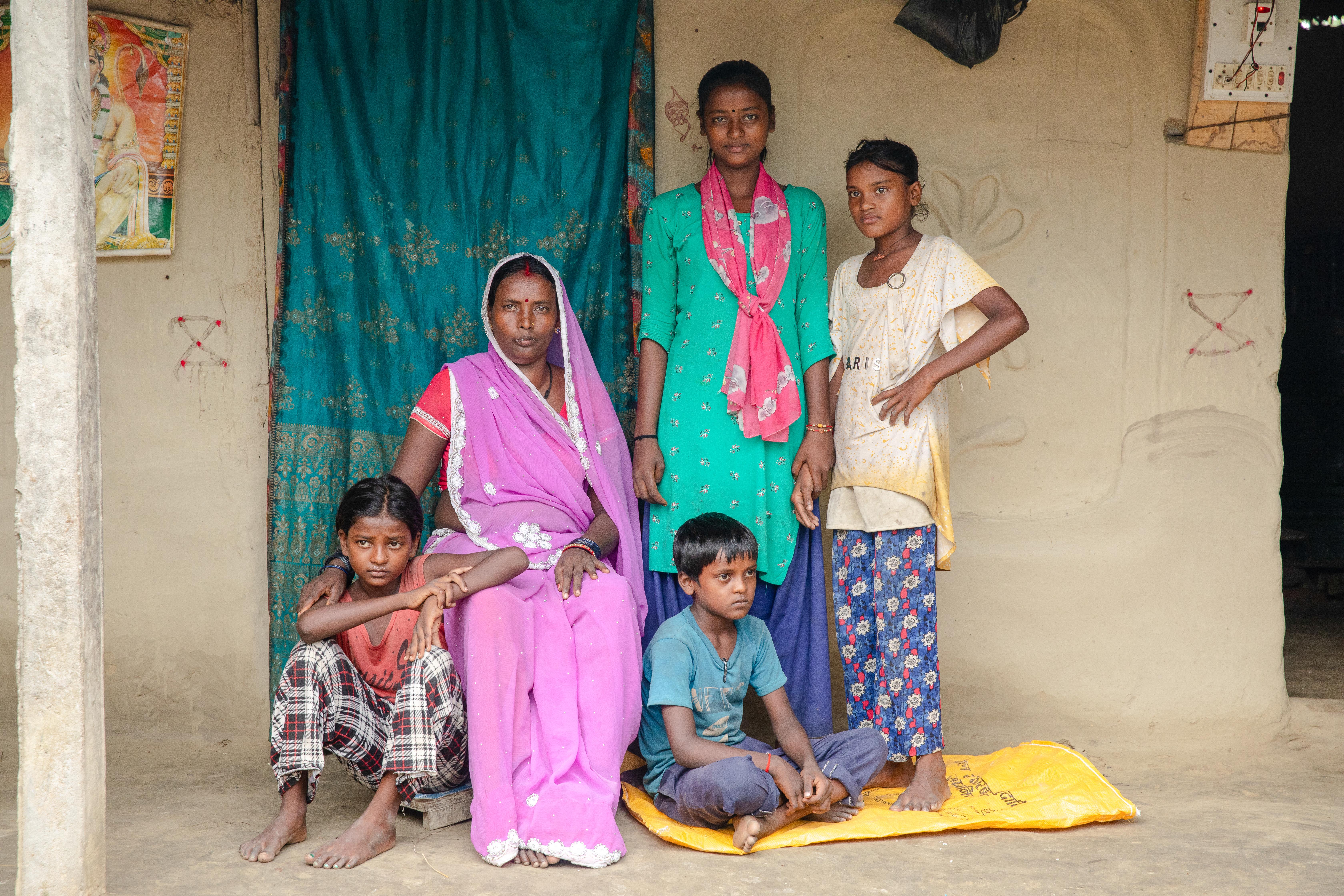 CH1875435_Devkala, 55, and Mamata, 13, and her siblings at their home in Saptari, Nepal