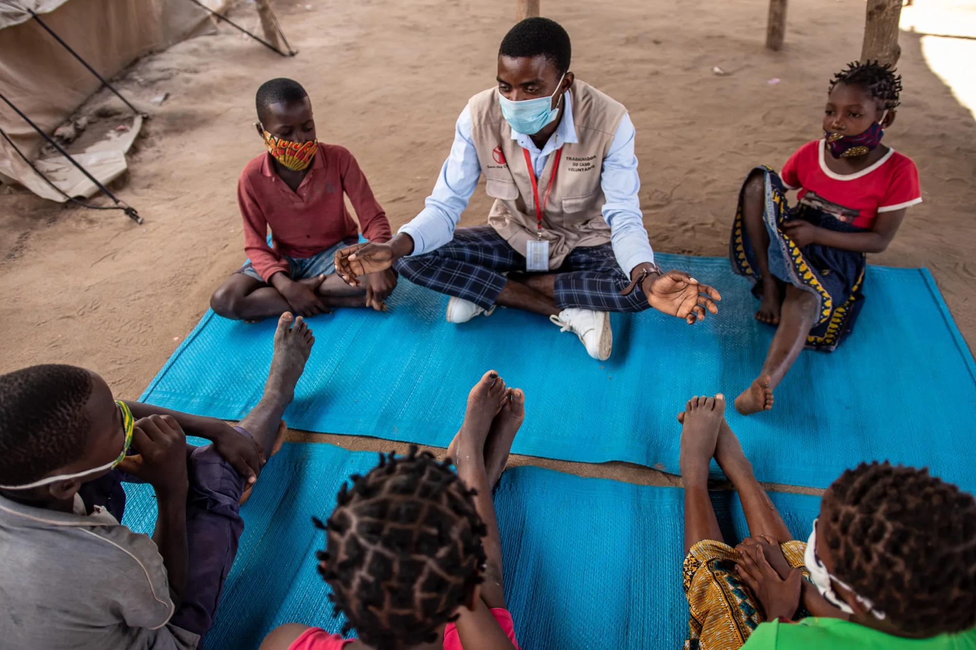 Xavier Jo?�o, a Save the Children Case Worker, conducts an activity for displaced children in Cabo Delgado, Mozambique.