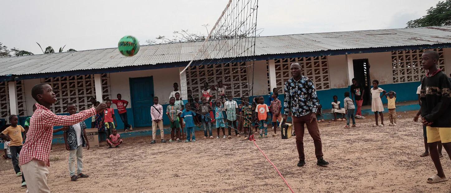 Children in southeastern Liberia play volleyball with the new ball and net from Spin Master���s Toy Movement.