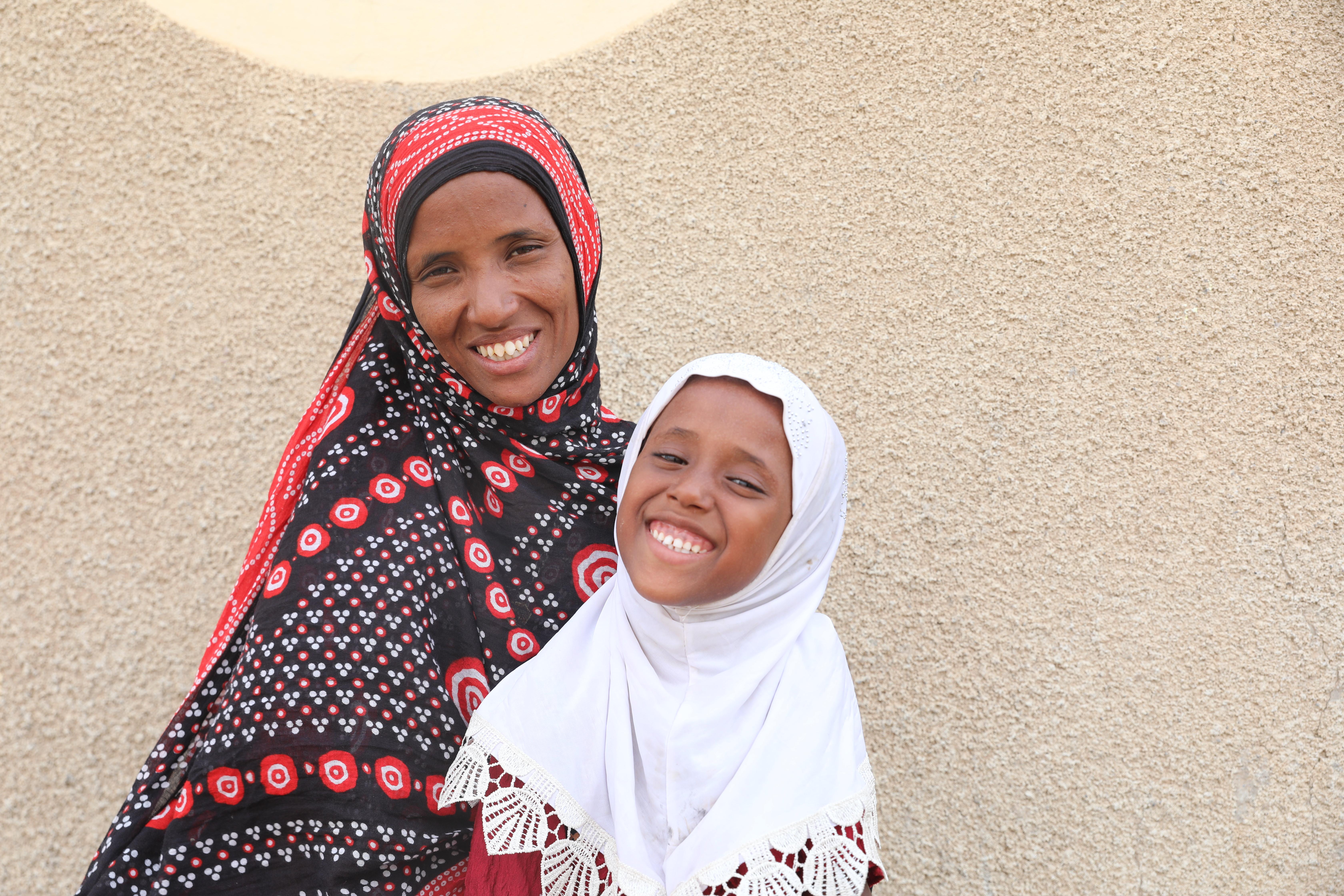 Jemila*, 26, smiles alongside her six-year-old daughter, Fatuma*, in the Afar region of Ethiopia.