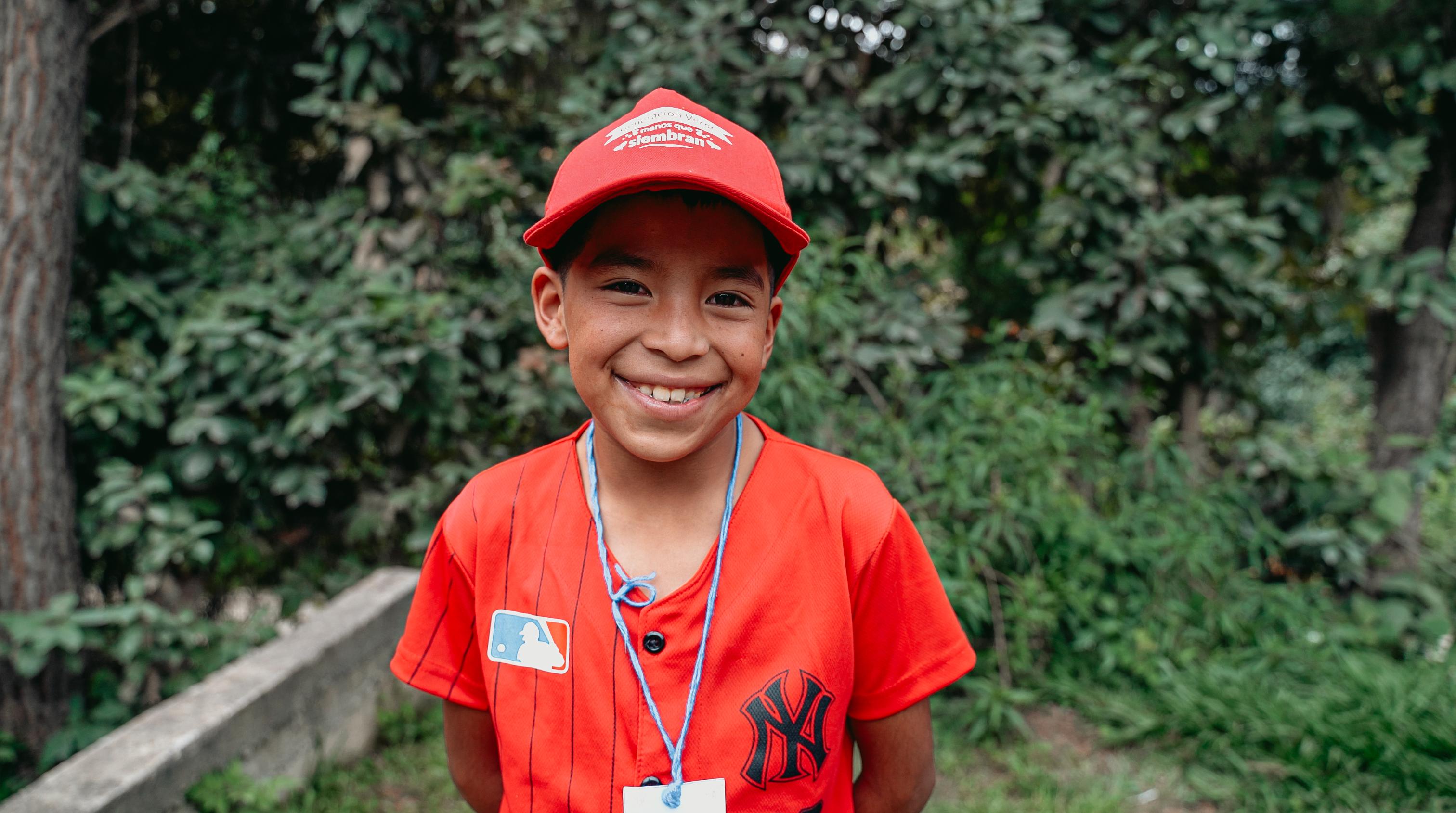 Justo, 10, poses for a portrait after taking part in a theatre play during the Generation Hope Week of Action in Quiché, Guatemala