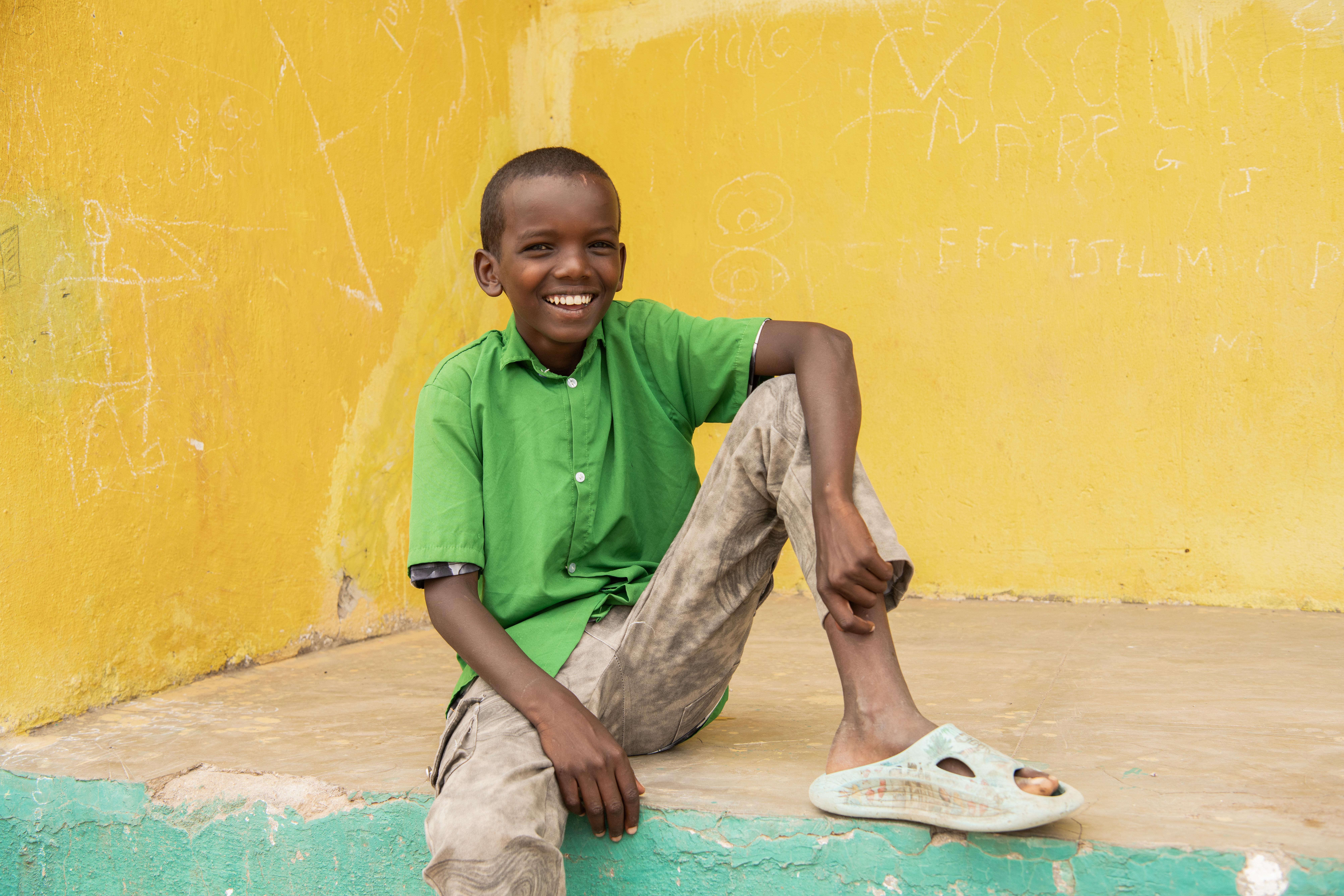 Mohamed*, 13, outside his school in Somali Region, Ethiopia.
