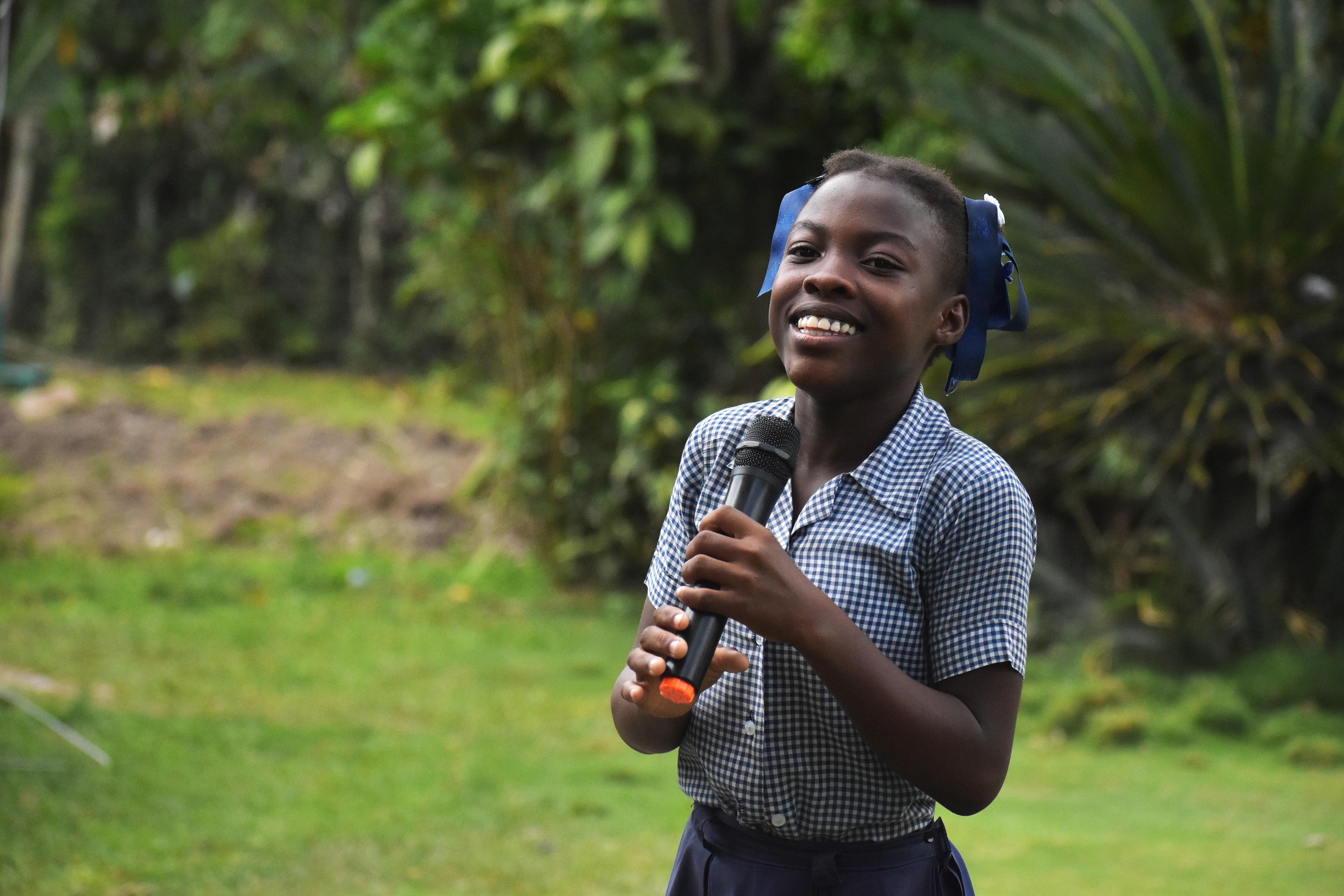 Wood*, 14,  speaks in front of her peers at school