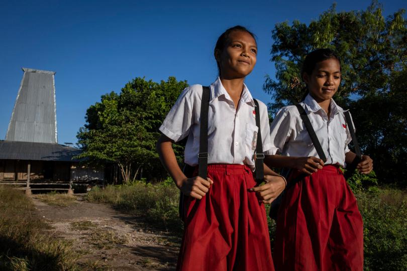 Cousins Atika and Dwi, walking to school in drought-affected East Sumba, Indonesia