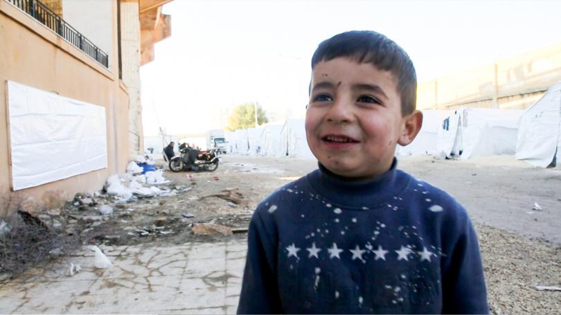 Faris*, 4, fled Ma'arat Nu'man with his family and is now sheltering in a former playground in Idlib, NW Syria