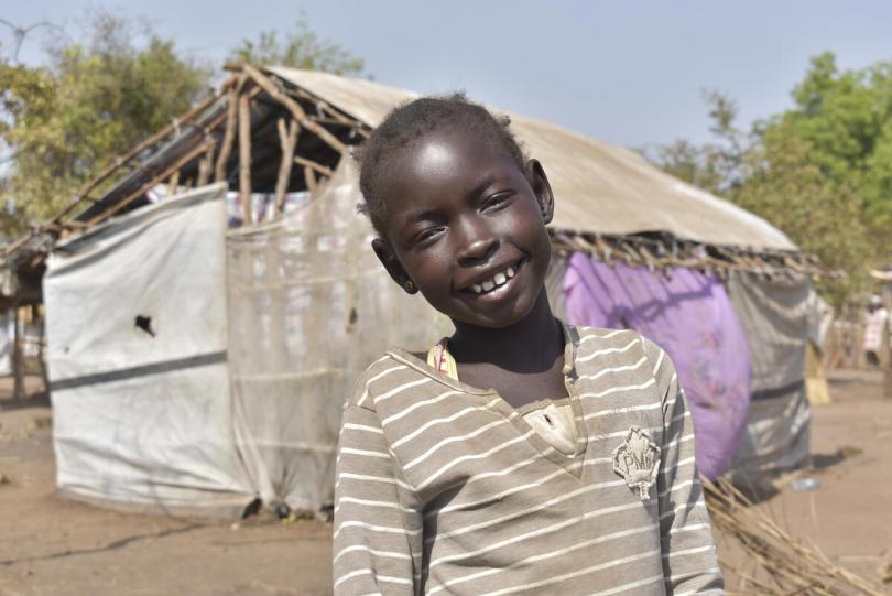 Adhiew* (8) at her temporary home after fleeing floods