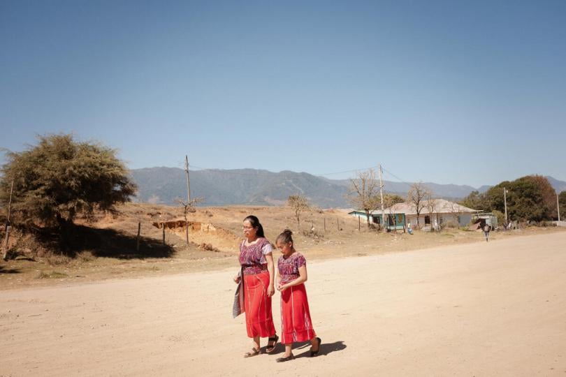 Maria Elena, 12, walking home with her sister-in-law Maria, 24 in Guatemala. 