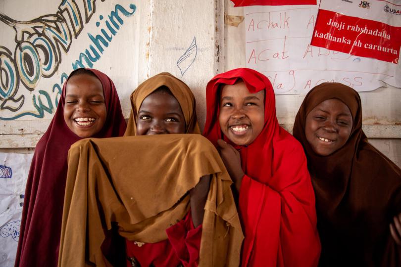  Ladan*, 10, and Sahra*, 10, with their friends at a Child Friendly Space in Puntland, Somalia