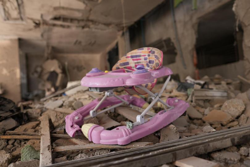 A child rocking chair among a rubble in Gaza