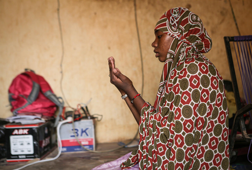 Kadidia*, aged 14, prays after school at her home in Mopti region, Mali. 