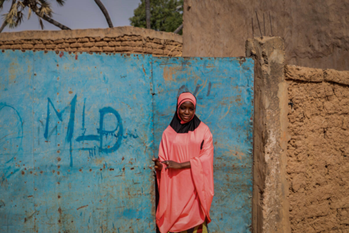 Dioura*, aged 12, outside her home in Tillaberi region, Niger. 