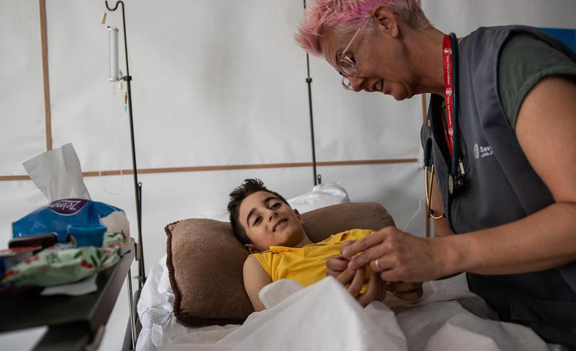 Emergency Health Unit Nurse Becky Platt attends to Ahmed* (10) at a hospital in the Gaza Strip