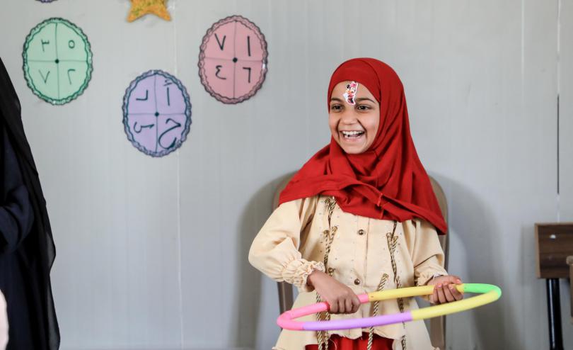 Sandi*, 9, during an activity at Save the Children's Temporary Learning Space in a displacement camp in Northeast Syria