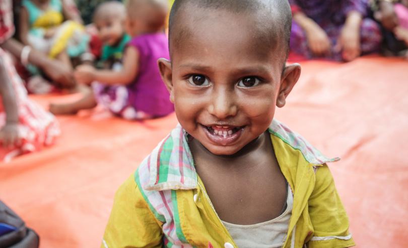 A boy whose mother takes part in the Suchana programme