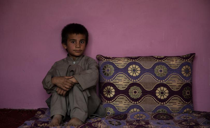 Hemat*, 10, at home in Kabul province