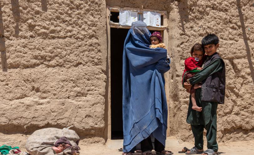 Sonia outside their home in Faryab province