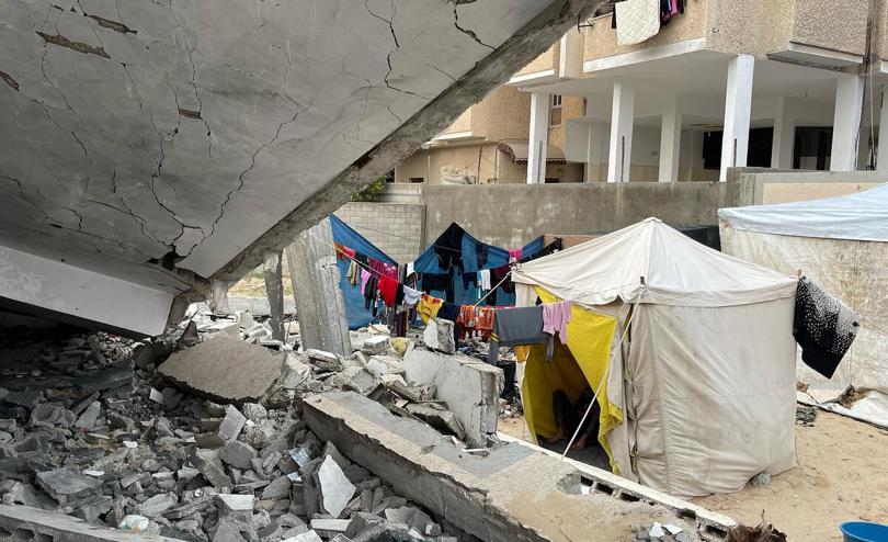 Families camped in rubble in Rafah, Gaza
