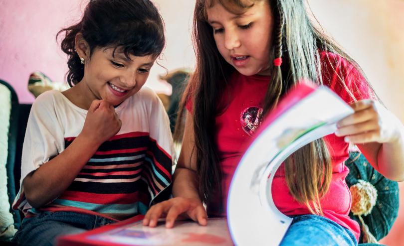 Girls reading a book