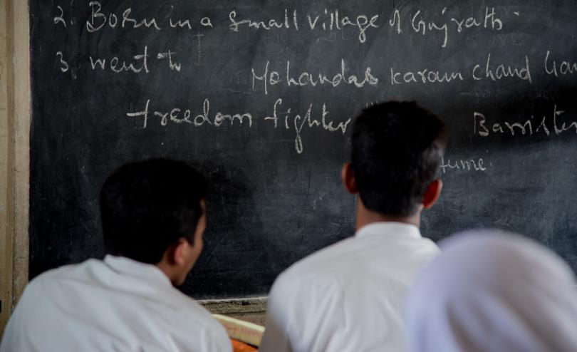 Rohingya refugees AK*, 17 and Mohammad*, 18, during a history class at their school in south India