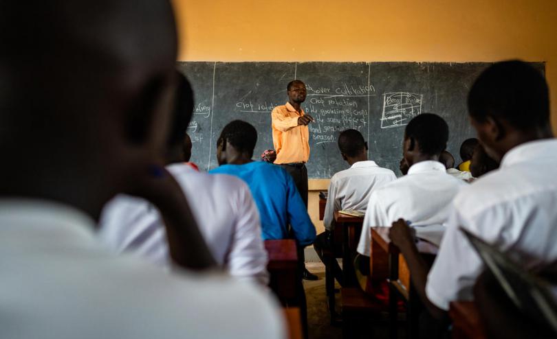 Children learn in a classroom in Uganda