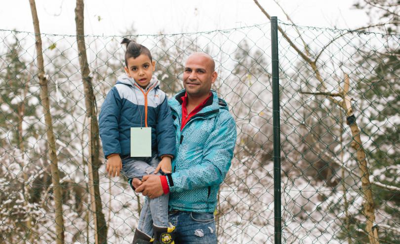 Bosnia Refugees Winter, Omar* aged 6 and his father housed in a camp supported by STC