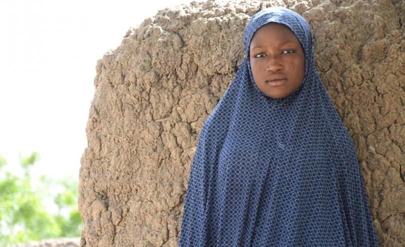 Haouaou, 17, outside her home, Maradi, Niger