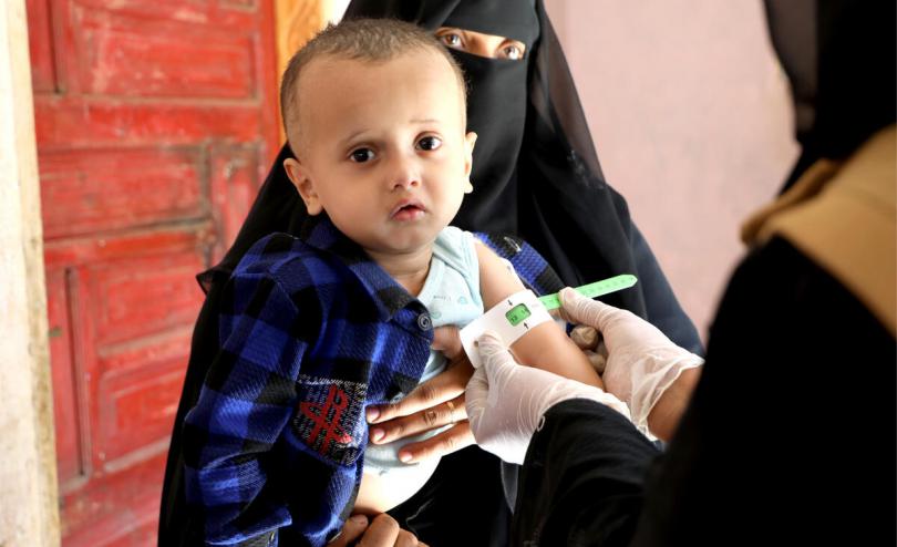 Amin*, 15 months old and his mother at a Save the Children-supported health facility in Taiz, Yemen.