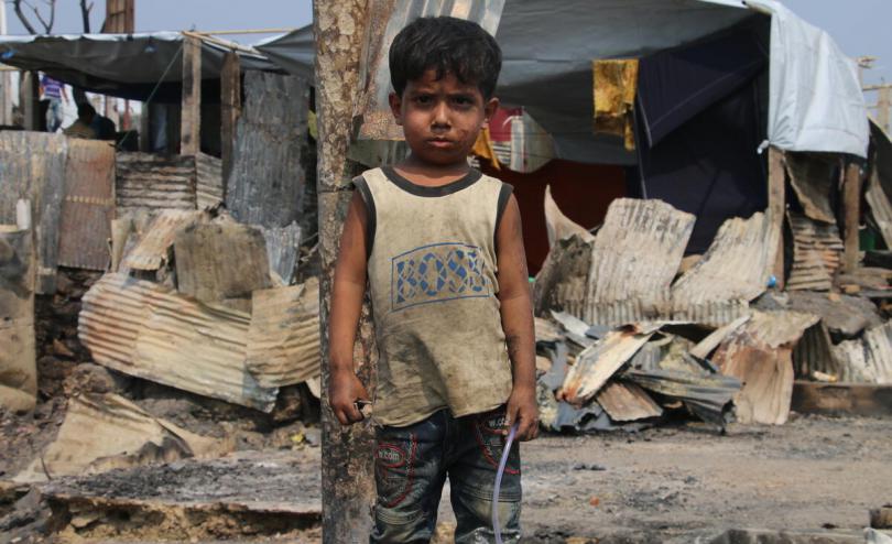 Rifat* 4, in the burnt out shell of the Madrasa (religious educational institution) after the Cox’s Bazar fire in March 2021