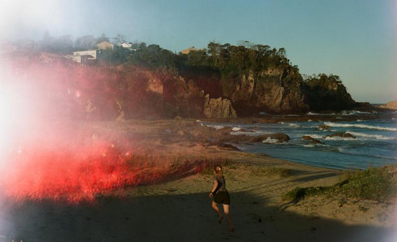 Romy, 9, runs along the beach at Batemans Bay, Australia.