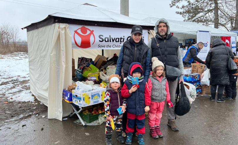 Artem*, Nadia* and their three children Sasha*, 7, Dmytrus*, 6, and Yuriy* 3 at Save the Children's distribution Artem*, Nadia* and their three children Sasha*, 7, Dmytrus*, 6, and Yuriy* 3 at Save the Children's distribution