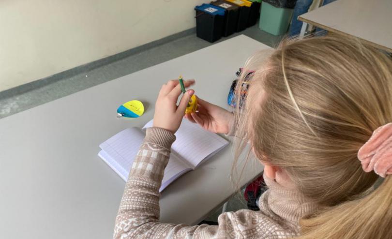 Children learning in the new school for Ukrainian refugee children in Warsaw