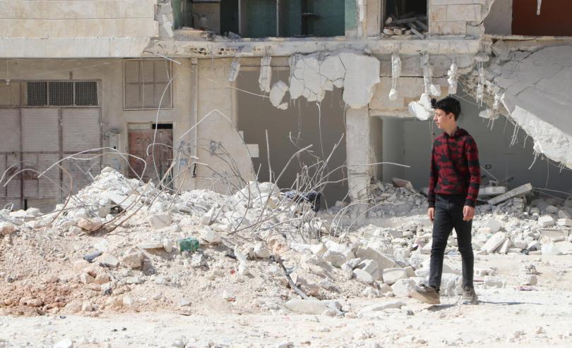 Hatem*, 15, walks through his earthquake damaged neighbourhood wearing a Go-Pro camera [ Hurras/ Save the Children] 