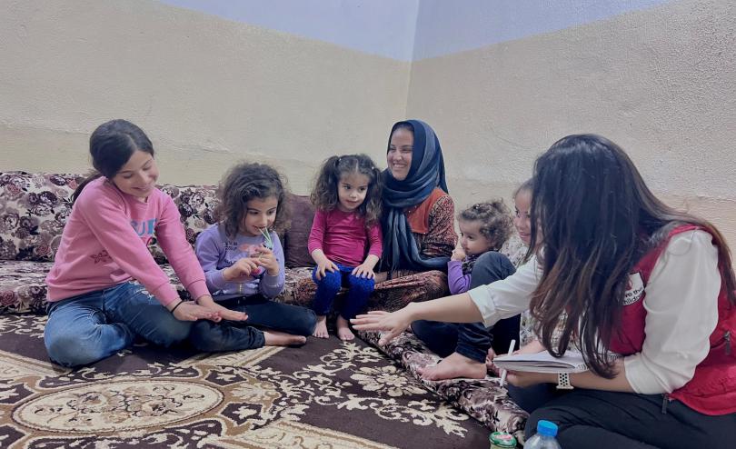 Manar and her family in a displacement camp in Duhok