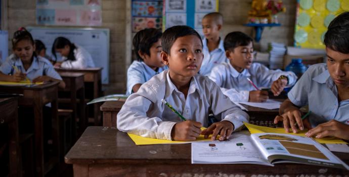 Meughong, 9, at his school on Tonle Sap Lake, Cambodia