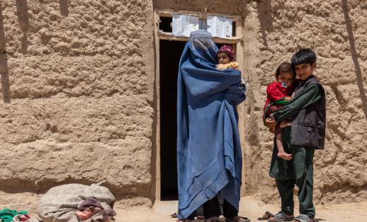 Sonia outside their home in Faryab province