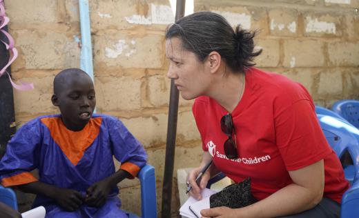 Inger meeting a child in Senegal