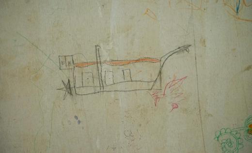 Children drew some boats on the wall of a room in the Rohingya camp in Aceh