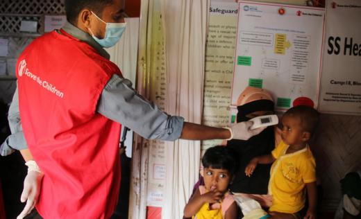 Modina* (24) and her daughters Humaida* (1) and Sifatara* (3) access medical services at Save the Children's health centre in Cox's Bazar, Bangladesh