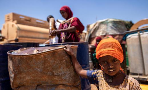 Amina* (27) and her family are impacted by the drought in Somalia and receive support from Save the Children's water trucking project