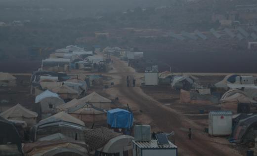 Tents in a displacement camp on a gloomy winter day Tents in a displacement camp on a gloomy winter day