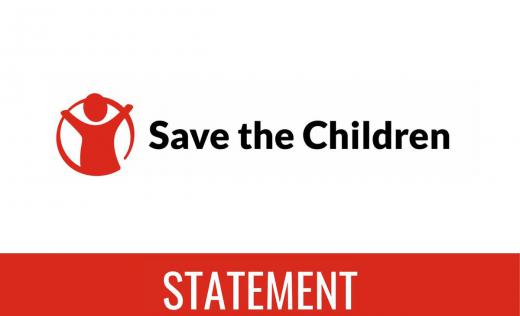 Red and white Save the Children statement card