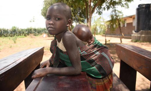 Child with sibling at school for food 