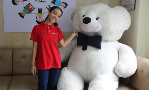 Anuska the child campaigner and the giant white air bear