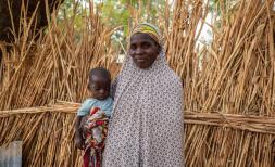 Aisha, 30, with her son Bashir, one, outside their home in a village in Jigawa State, Nigeria.
