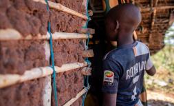 Luis* (14) lives with his neighbour Andre* (71) after his father was killed when armed men attacked his village in Cabo Delgado, Mozambique