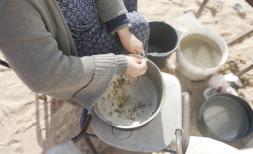 A woman with an empty pan in Gaza