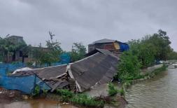 Damage to a building by Cyclone Remal in Bangladesh 